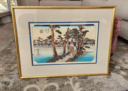 Japanese ukiyo-e woodblock print titled Yoshiwara: Mount Fuji on the Left by the artist Utagawa Hiroshige