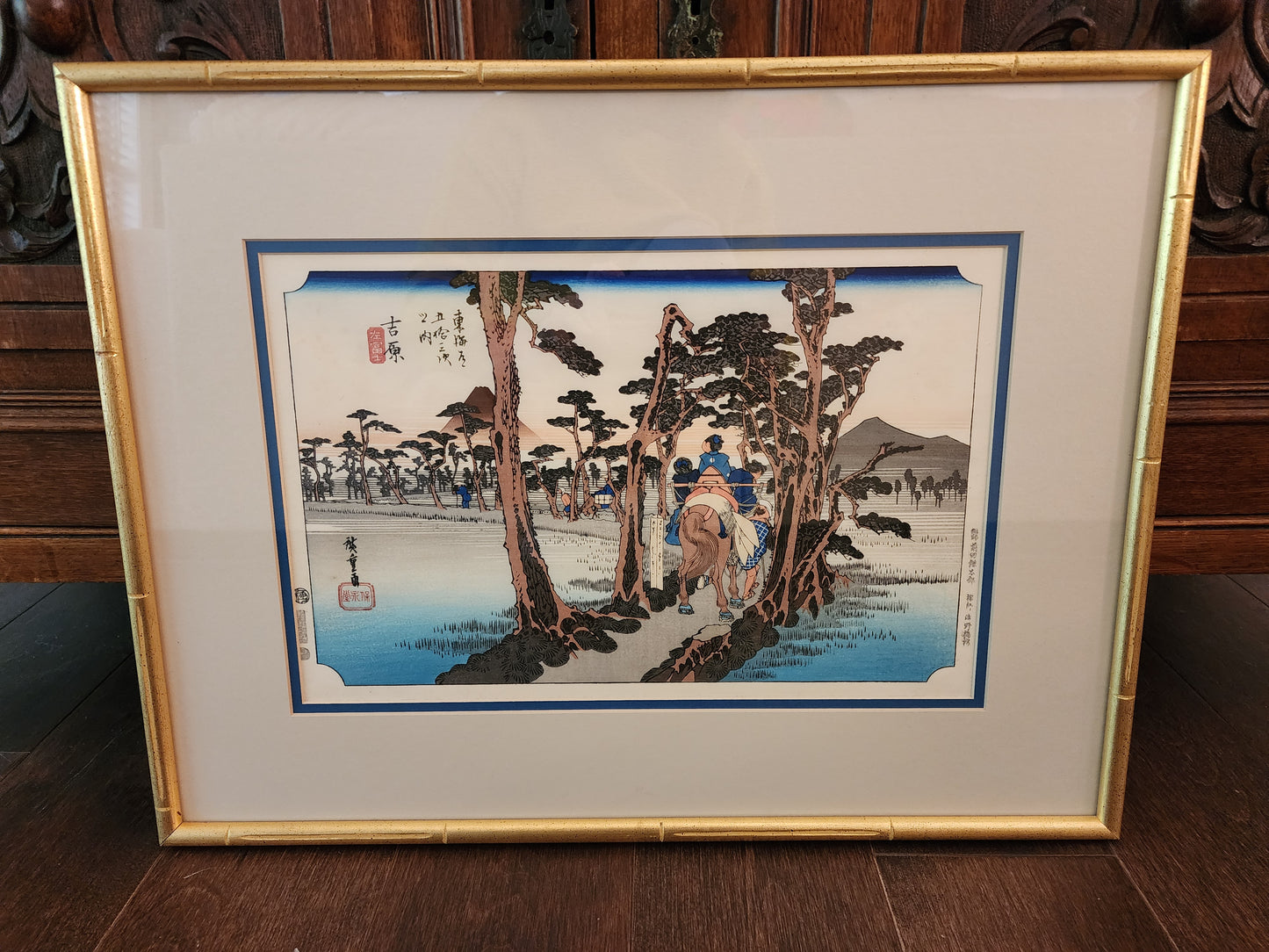 Japanese ukiyo-e woodblock print titled Yoshiwara: Mount Fuji on the Left by the artist Utagawa Hiroshige