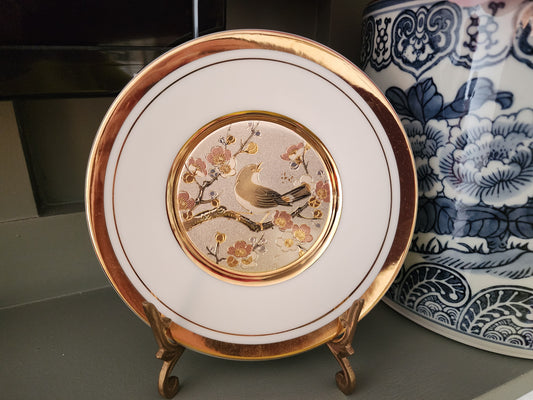 The Art of Chokin porcelain plate, featuring a detailed bird and cherry blossoms scene. 